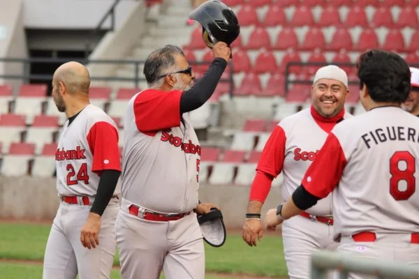 baseball player celebrating with teammates